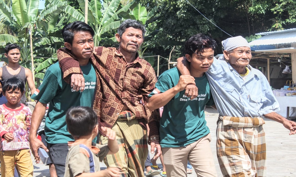 Disaster Simulation and Trial of Evacuation Route and Gathering Point of Santong Mulia Village